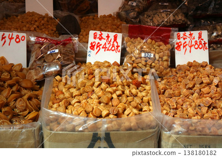 Dried scallops for sale at a dried goods store on De Voeugeot Road West, Hong Kong. The highest quality are from Japan and are expensive. These are from Qingdao, China. Dried scallops for sale at a dried goods store on De Voeugeot Road West, Hong Kong. The highest quality are from Japan and are expensive. These are from Qingdao, China. 138180182