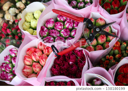 Colorful flowers lined up at a flower shop Colorful flowers lined up at a flower shop 138180199