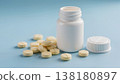 Close-up, soft light, 3D render of a white pill bottle with removed cap and spilled tablets on a pastel blue surface, realistic soft reflections, clean medical aesthetic, the camera is stationary. 138180897
