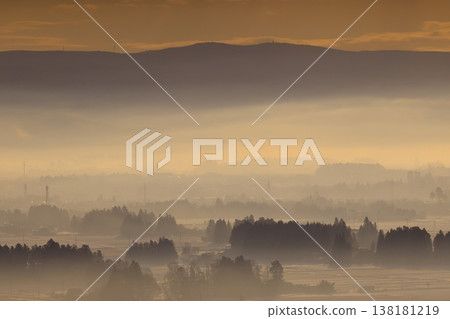 Misty fog at sunrise Misty fog at sunrise 138181219