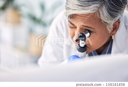 Mature woman, doctor and otoscope, hearing test and exam for audiology check, consultation and healthcare. Ent tools, otolaryngology and medical professional with equipment for wellness in hospital Mature woman, doctor and otoscope, hearing test and exam for audiology check, consultation and healthcare. Ent tools, otolaryngology and medical professional with equipment for wellness in hospital 138181856