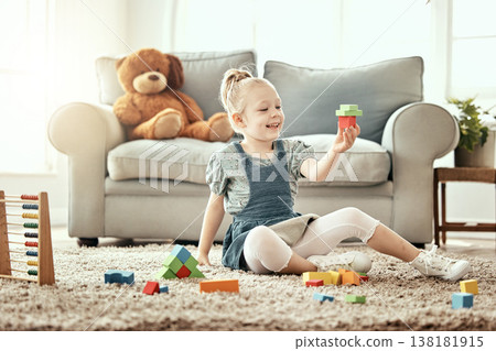 Child, playing and building blocks on living room floor, home and montessori style for fun, development and game. Colourful toys, learning and creativity for educational activity, relax and happiness 138181915