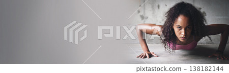 Fitness, woman and push up on banner for workout, athletic or sports exercise outdoor with serious face. Training, athlete and challenge for wellness, healthy body or strong on mockup space on floor 138182144