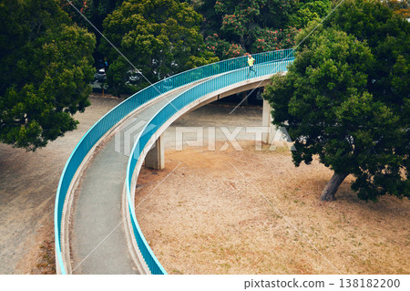 Man, running and above bridge in nature, countryside or outdoor in environment with path in woods. Athlete, run or walking on road for cardio, fitness or exercise in forest with eco infrastructure Man, running and above bridge in nature, countryside or outdoor in environment with path in woods. Athlete, run or walking on road for cardio, fitness or exercise in forest with eco infrastructure 138182200