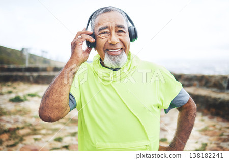 Happy, headphones and senior man hiking and listening to music, playlist or album for cardio workout. Smile, nature and portrait of elderly male person streaming a song for outdoor trekking in woods. Happy, headphones and senior man hiking and listening to music, playlist or album for cardio workout. Smile, nature and portrait of elderly male person streaming a song for outdoor trekking in woods. 138182241