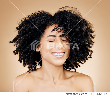 Woman, curly or wind in afro hair for fun on studio background in healthy hairstyle growth, texture or frizz treatment success. African beauty model, shake or change by shampoo transformation results Woman, curly or wind in afro hair for fun on studio background in healthy hairstyle growth, texture or frizz treatment success. African beauty model, shake or change by shampoo transformation results 138182314