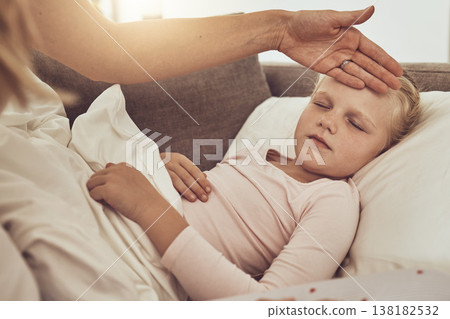 Fever, mom and sick child on sofa with temperature check, stress and health care treatment in home. Healthcare, mother and sleeping daughter on couch, hand on forehead in comfort or medical emergency 138182532