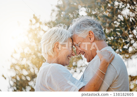 Senior couple, forehead or hug in nature garden for love, support or bonding retirement trust. Woman smile, lens flare or elderly man in embrace for relationship, connection and together in backyard Senior couple, forehead or hug in nature garden for love, support or bonding retirement trust. Woman smile, lens flare or elderly man in embrace for relationship, connection and together in backyard 138182605