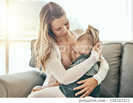 Hug, comfort and a mother and child on the sofa for support, crying and sad together. Family, house and a mom holding a tired or sick girl kid on a living room couch for care, love and console Hug, comfort and a mother and child on the sofa for support, crying and sad together. Family, house and a mom holding a tired or sick girl kid on a living room couch for care, love and console 138183321
