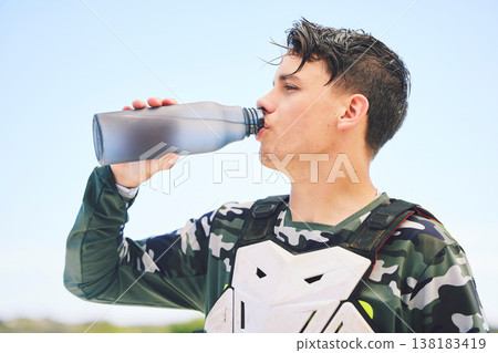 Man, rider and water for rest after exercise, training or activity on vacation, holiday or travel for competition. Person, racer and break in Namibia for sport, summer and relax with profile in sun Man, rider and water for rest after exercise, training or activity on vacation, holiday or travel for competition. Person, racer and break in Namibia for sport, summer and relax with profile in sun 138183419