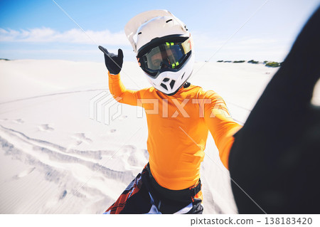 Motorbike, man and posing for selfie in desert for race challenge, freedom and wellness in action. Athlete, fast and adrenaline in extreme sports, fitness and energy for competition on dirt bike 138183420