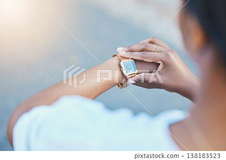 Closeup, woman and arm with watch for time management with elegance for business meeting in city. African person, entrepreneur and waiting by delay, check or late for transport to commute to client 138183523