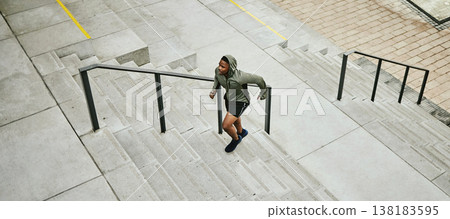 Fitness, city and black man running on stairs outdoor, exercise and training healthy body in urban town top view. Sports, cardio and African athlete on steps for workout, energy and jog for wellness Fitness, city and black man running on stairs outdoor, exercise and training healthy body in urban town top view. Sports, cardio and African athlete on steps for workout, energy and jog for wellness 138183595