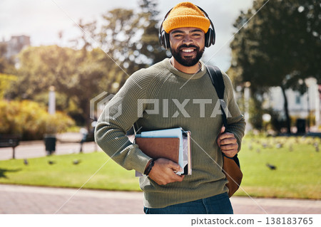 Student, headphones and backpack on campus of education, college or university podcast in park. Portrait of african man walking, travel and books with audio, electronics or listening to music outdoor Student, headphones and backpack on campus of education, college or university podcast in park. Portrait of african man walking, travel and books with audio, electronics or listening to music outdoor 138183765