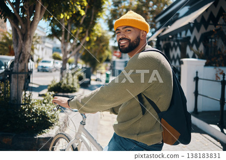 Bicycle, fashion and portrait of man in city for commute, adventure and journey in urban town. Fashion, style and happy person on bike for eco friendly transport, carbon footprint and cycling in road 138183831