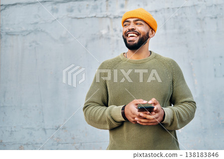 Cellphone, excited and young man by wall networking on social media, mobile app or the internet. Technology, happy and person from Colombia scroll on website with cellphone in city by gray background 138183846