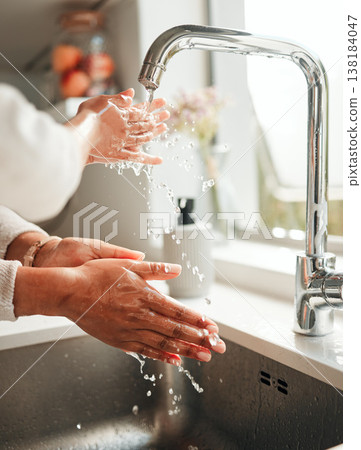 Hygiene, water and washing hands in a kitchen basin for health, cleaning and fresh before cooking. Morning, sustainability and a person with liquid for home sanitation, purity and routine in a sink 138184047