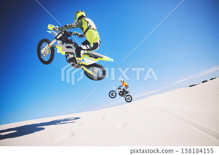 Motorbike, people and sports with fitness, competition and training with safety, desert and workout. Athletes, sand and bikers with mockup, practice and cycling with exercise, challenge and energy Motorbike, people and sports with fitness, competition and training with safety, desert and workout. Athletes, sand and bikers with mockup, practice and cycling with exercise, challenge and energy 138184155