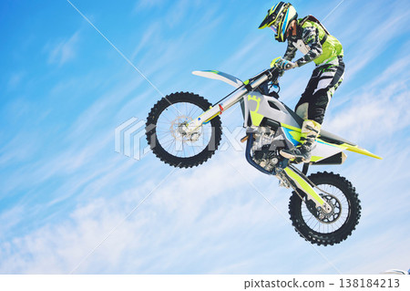 Training, person and motorbike with sky background, fitness and exercise with competition. Biker, practice and athlete with a bike, sports and health with cycling, travel and freedom with energy Training, person and motorbike with sky background, fitness and exercise with competition. Biker, practice and athlete with a bike, sports and health with cycling, travel and freedom with energy 138184213