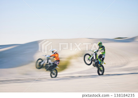 Speed, desert and people for cycling on a motorbike for travel, sports or freedom. Moving, fast and racers on bikes for adrenaline, challenge or driving on a sand course for adventure or competition 138184235