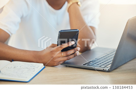 Phone, office and hands of business person on laptop for social media, internet and online chat. Corporate, workplace and person on smartphone and computer for website, research and network at desk Phone, office and hands of business person on laptop for social media, internet and online chat. Corporate, workplace and person on smartphone and computer for website, research and network at desk 138184453