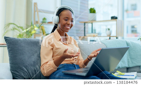 Black woman, laptop or video call on house sofa for networking, b2b customer deal or freelance business consulting. Smile, happy or talking employee on remote work technology or mobile communication Black woman, laptop or video call on house sofa for networking, b2b customer deal or freelance business consulting. Smile, happy or talking employee on remote work technology or mobile communication 138184476