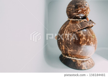 Handmade Coconut Duck Decoration Isolated as Charming Tropical Craft Souvenir Handmade Coconut Duck Decoration Isolated as Charming Tropical Craft Souvenir 138184481