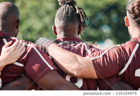 Rugby team, back and men huddle for support, collaboration or cooperation. Sports, group hug together and rear view for solidarity, hands of community and trust in game, competition or training match Rugby team, back and men huddle for support, collaboration or cooperation. Sports, group hug together and rear view for solidarity, hands of community and trust in game, competition or training match 138184974