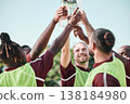 Soccer team, water bottle and toast with teamwork, achievement and support on field. Fitness, workout and sport training of men group with smile and celebration at game outdoor with drink and cheers 138184980
