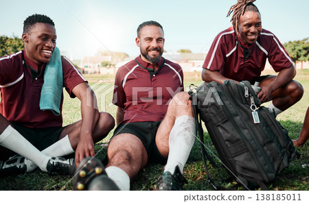 Fitness, people and rugby players on a break at training for planning strategy for game or match. Sports, group and athletes talking for team building and motivation on an outdoor field for practice. Fitness, people and rugby players on a break at training for planning strategy for game or match. Sports, group and athletes talking for team building and motivation on an outdoor field for practice. 138185011