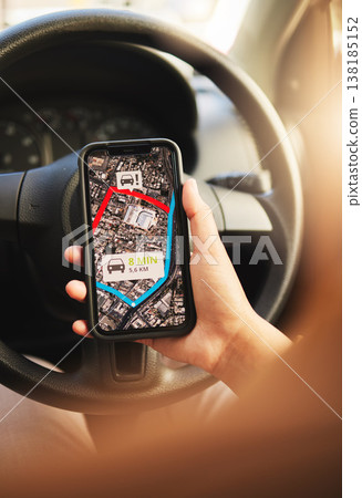 Phone, map and hands of person in a car for location, search or navigation closeup. Smartphone, travel and driver check app for online traffic notification, direction or road trip route in a vehicle 138185152