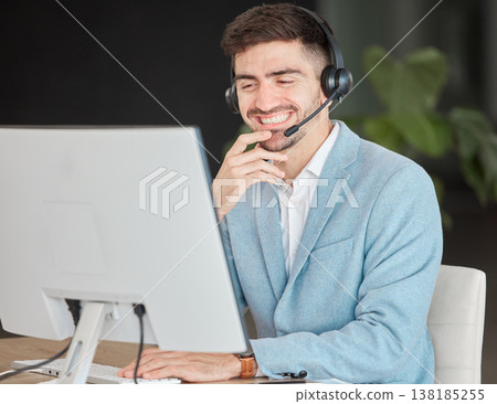 Man, headset and smile while looking at screen in office, talking and customer care for telemarketing. Person, consultant or operator with technology for business, e commerce or management of clients 138185255