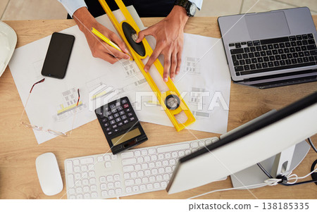 Architecture, hands and drawing on desk with design, top of workspace with engineering and tech. Architect person with illustration, floor plan paperwork for construction project and productivity Architecture, hands and drawing on desk with design, top of workspace with engineering and tech. Architect person with illustration, floor plan paperwork for construction project and productivity 138185335