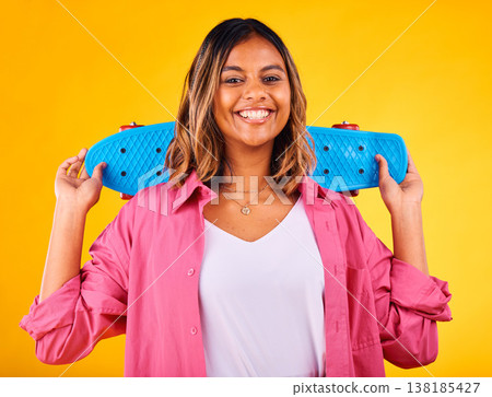 Woman, portrait and smiling with skateboard on yellow studio background, skater and excited. Cool, gen z face and happiness to skate, play and enjoy free time, in fashion clothes, outfit and stylish Woman, portrait and smiling with skateboard on yellow studio background, skater and excited. Cool, gen z face and happiness to skate, play and enjoy free time, in fashion clothes, outfit and stylish 138185427