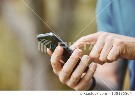 Hands, closeup and phone or outdoor exercise for fitness or location for training or communication. Runner, typing and health progress on workout app or touch screen for directions, wellness or sport 138185504