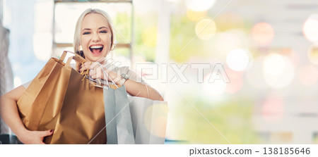 White woman, shopping and smile for purchase, bokeh and .happiness with bags, spending money and customer. Portrait, sale and mall for clothes, discount and promotion for fashion, buying and excited White woman, shopping and smile for purchase, bokeh and .happiness with bags, spending money and customer. Portrait, sale and mall for clothes, discount and promotion for fashion, buying and excited 138185646