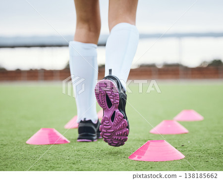 Cone, legs or athlete running in sports training, workout and warm up exercise on a outdoor hockey turf. Footwear closeup, back or fast person on grass pitch playing in a game for fitness speed Cone, legs or athlete running in sports training, workout and warm up exercise on a outdoor hockey turf. Footwear closeup, back or fast person on grass pitch playing in a game for fitness speed 138185662