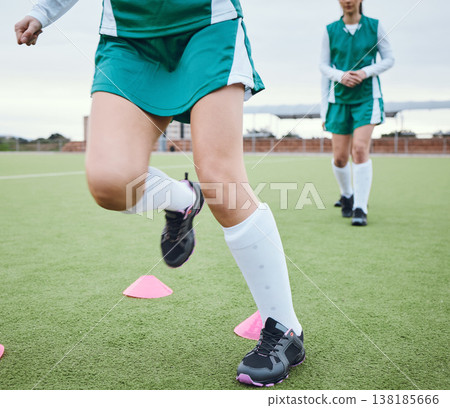 Cone, legs or team running for speed training, workout and warm up exercise on a outdoor hockey turf. Footwear closeup, balance or sports people on grass pitch playing in a practice game for fitness Cone, legs or team running for speed training, workout and warm up exercise on a outdoor hockey turf. Footwear closeup, balance or sports people on grass pitch playing in a practice game for fitness 138185666