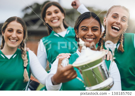 Sports women, team and trophy for success in portrait, celebration or winning competition on field. Champion girl group, friends and diversity for hockey, goal or happy outdoor at stadium for contest Sports women, team and trophy for success in portrait, celebration or winning competition on field. Champion girl group, friends and diversity for hockey, goal or happy outdoor at stadium for contest 138185702