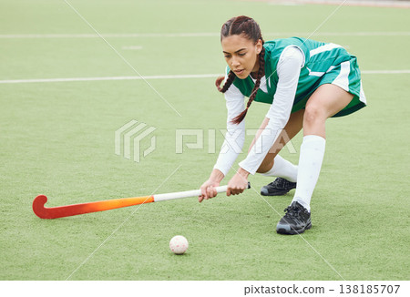 Hockey, sports or woman on turf in fitness training, game or competition with ball, stick or action. Strong, athlete or fit girl player in exercise, workout or motion on artificial grass for power Hockey, sports or woman on turf in fitness training, game or competition with ball, stick or action. Strong, athlete or fit girl player in exercise, workout or motion on artificial grass for power 138185707