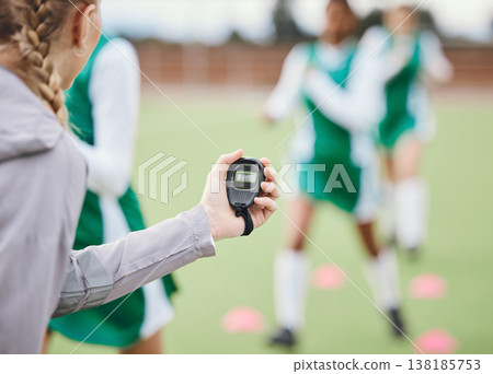 Coach, timer and team in training, field and sports in blurred background. Trainer, stopwatch and teaching for progress, fitness and performance by digital, athlete and exercise in diversity on clock Coach, timer and team in training, field and sports in blurred background. Trainer, stopwatch and teaching for progress, fitness and performance by digital, athlete and exercise in diversity on clock 138185753
