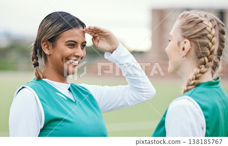 Woman, friends and hockey salute for fun on sports field for game in competition, training or fitness. Female athlete, play and exercise for outdoor contest in sun for strong workout, cardio or smile Woman, friends and hockey salute for fun on sports field for game in competition, training or fitness. Female athlete, play and exercise for outdoor contest in sun for strong workout, cardio or smile 138185767