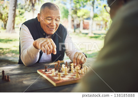 Happy, table and people in nature for chess, strategy and relax with a sport together. Smile, thinking and elderly or senior friends in retirement with games in a park on a board for competition Happy, table and people in nature for chess, strategy and relax with a sport together. Smile, thinking and elderly or senior friends in retirement with games in a park on a board for competition 138185888