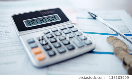 Inflation, calculator and financial crisis document with money, coins or finance problem in the economy crash. Paperwork, accounting and information on stock exchange for bad investment or budget Inflation, calculator and financial crisis document with money, coins or finance problem in the economy crash. Paperwork, accounting and information on stock exchange for bad investment or budget 138185909