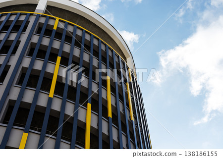 Architectural marvel highlighting transparency and vibrant colors embodying environmental principles 138186155