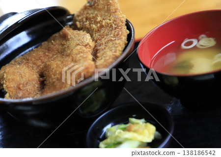 A set meal of waraji katsudon (straw sandal-shaped pork cutlet rice bowl) and miso soup, a local specialty of Chichibu City, Saitama Prefecture. 138186542
