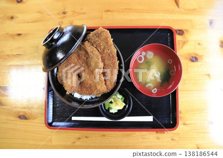 A set meal of waraji katsudon (straw sandal-shaped pork cutlet rice bowl) and miso soup, a local specialty of Chichibu City, Saitama Prefecture. 138186544