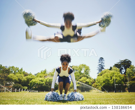 Portrait, cheerleader or girl in jump motion on field for fitness training in outdoor workout for performance. Smile, blur or happy sports woman on grass for motivation, inspiration or support 138186654