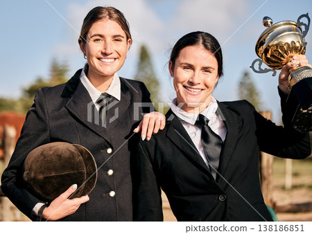 Portrait, young and equestrian for champion in competition for horse riding with smile at ranch. Caucasian, girls or people with happiness in celebration for success, training and race for sports Portrait, young and equestrian for champion in competition for horse riding with smile at ranch. Caucasian, girls or people with happiness in celebration for success, training and race for sports 138186851