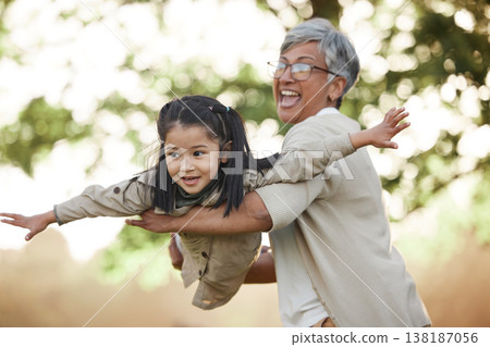 Family, girl child or grandmother with fly or airplane for fantasy play, fun game or together with bokeh in nature. People, kid or grandma outdoor with happiness for love, care and bonding or excited 138187056